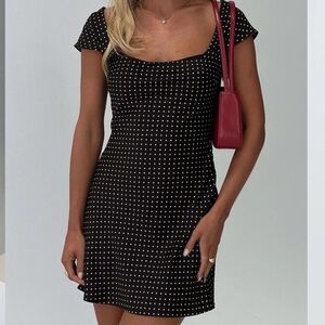 NWOT Lucienna polka dot mini dress black / white.
(Fabric imperfection on7th pic